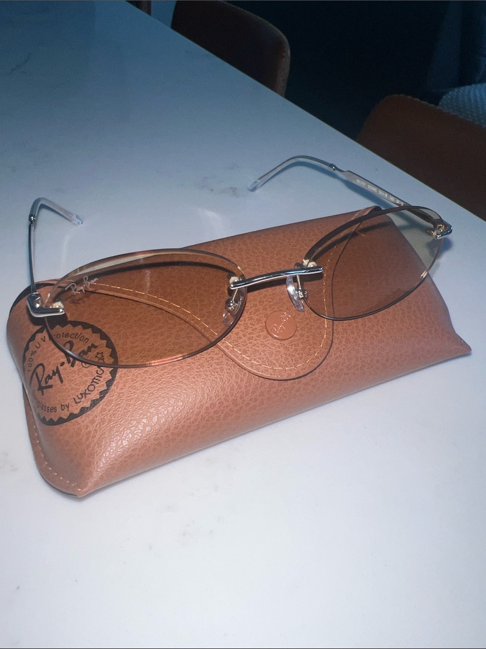 Ray-Ban Rimless Sunglasses with Brown transitions Lenses and Silver Temples